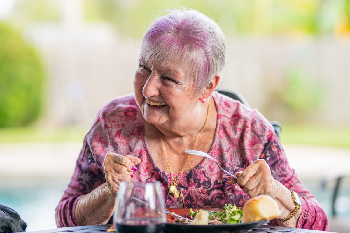 Senior enjoying nutritious meal with family